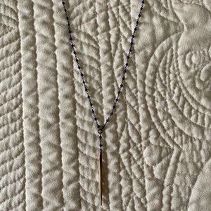 Beaded necklace with gold pendant